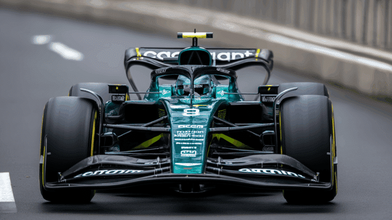 Max Verstappen driving an Aston Martin Formula 1 car at high speed on a racetrack. He’s wearing a green Aston Martin race suit and custom helmet, tightly seated in the cockpit as he takes a sharp corner. The car features the iconic metallic British racing green livery, gleaming under track lighting. The scene is dramatic and unexpected, suggesting a bold shift in F1 dynamics