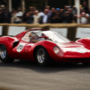 Vintage Ferrari Dino 206S racing at the 2025 Goodwood Members’ Meeting with a crowd in the background, driven by Frank Stippler during his legendary Gurney Cup victory.