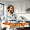 formula 1 champion lewis hamilton shares a lighthearted and quirky tale about a pizza delivery mishap that had fans laughing. discover the amusing details behind his culinary conundrum and how it unfolded in his busy life.
