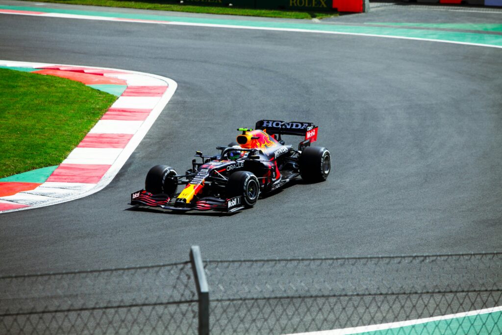 photo of a F1 car in the racing circuit